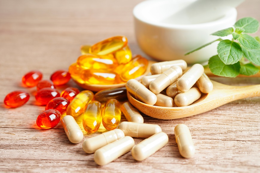 Alternative medicine herbal organic capsule with vitamin E omega 3 fish oil, mineral, drug with herbs leaf natural supplements for healthy good life.